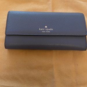 Kate Spade brand new large wallet in pristine condition.